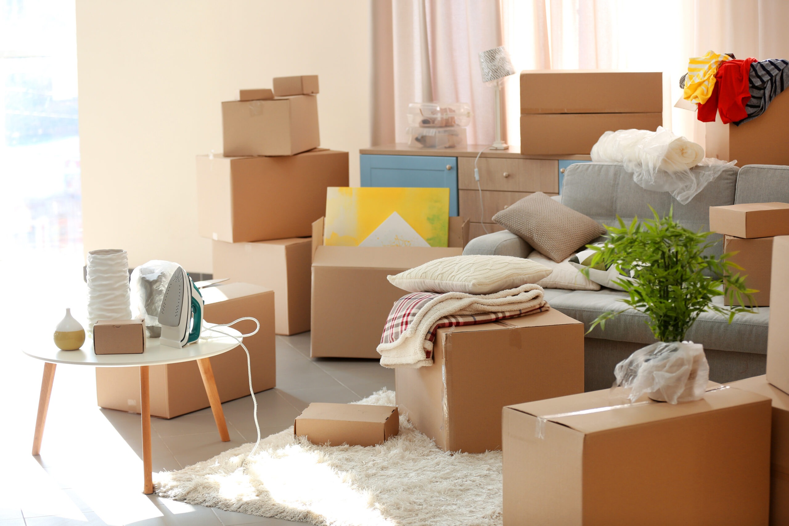 Packed household goods for moving into new house apartment
